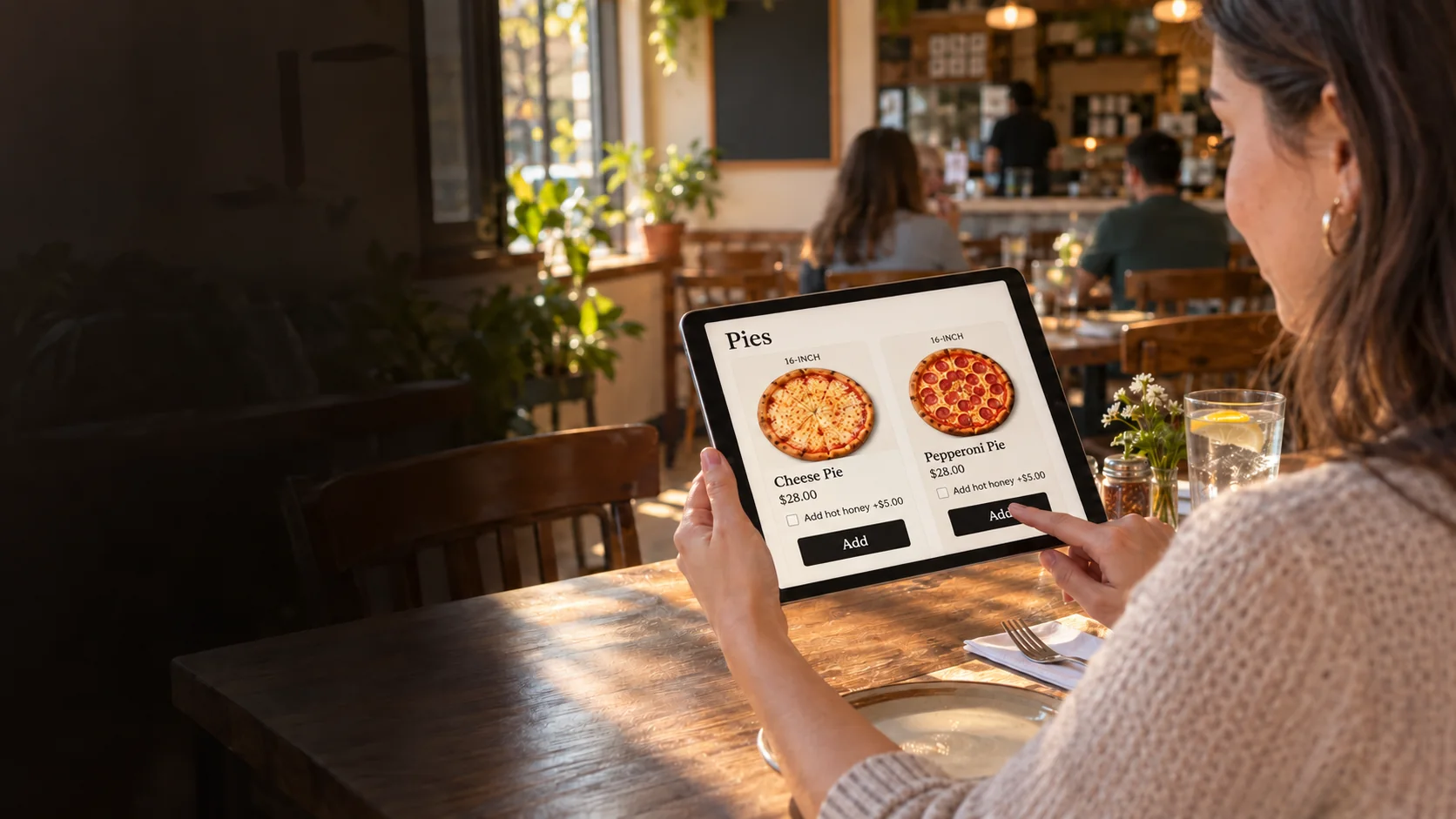 Customer using Take Orders Pro to add a pepperoni pie on a tablet